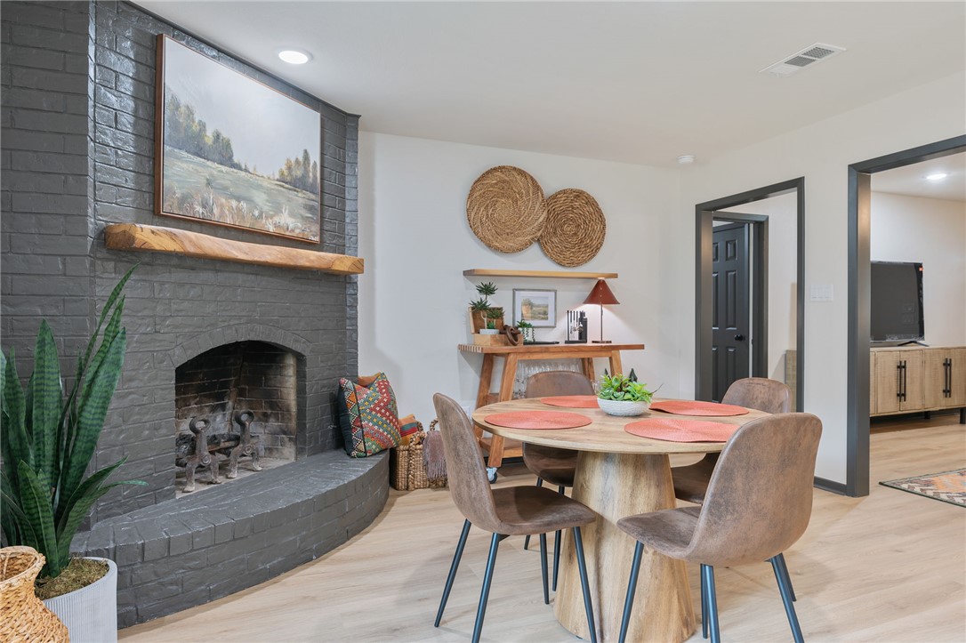 1509 Barak Lane Bryan, TX 77802 - Photo 14 of 24 a view of a dining room with furniture and chandelier