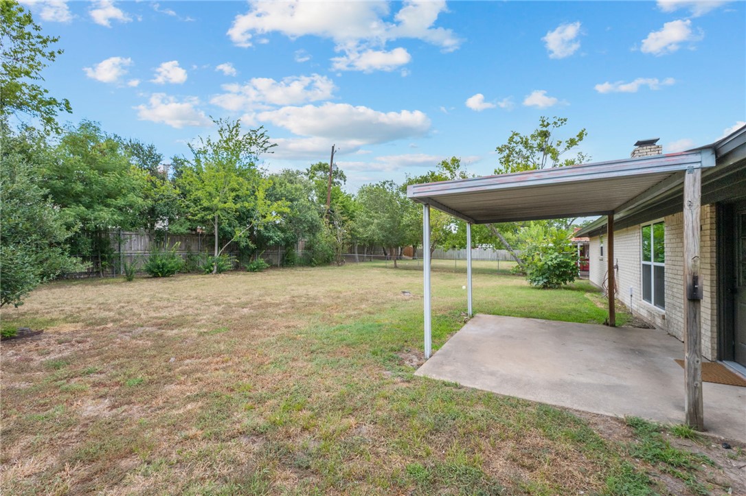 1509 Barak Lane Bryan, TX 77802 - Photo 23 of 24 a view of a yard with porch and garden