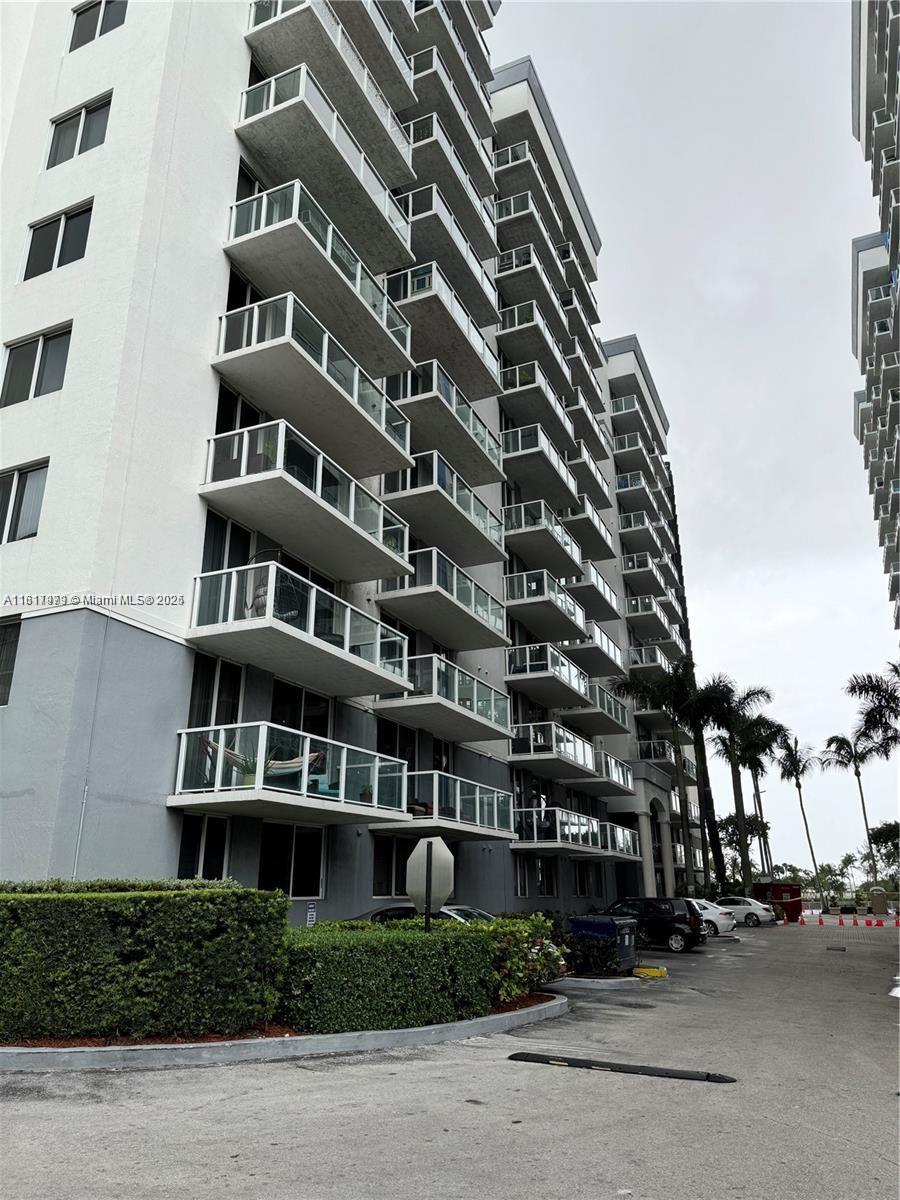 5091 Northwest 7th Street, Unit 615 Miami, FL 33126 - Photo 2 of 40 a front view of a building