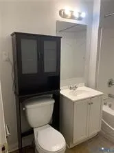 a kitchen with a stove and a microwave