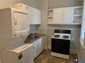 3119 A 4th Avenue Richmond, VA 23222 - Photo 7 of 15 a kitchen with a stove and a microwave