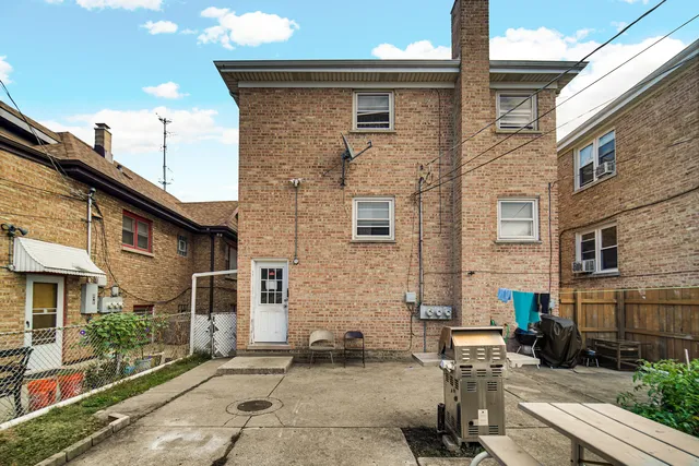 a brick building with a large windows
