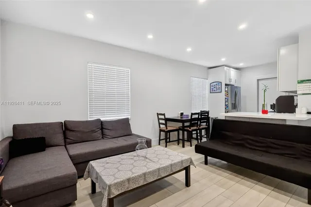 a living room with furniture and a couch