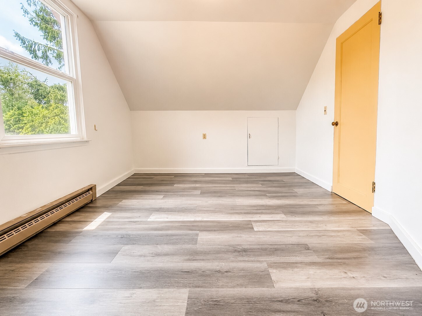 2154 Cranberry Road Grayland, WA 98547 - Photo 20 of 38 a view of a room with a wooden floor and a window