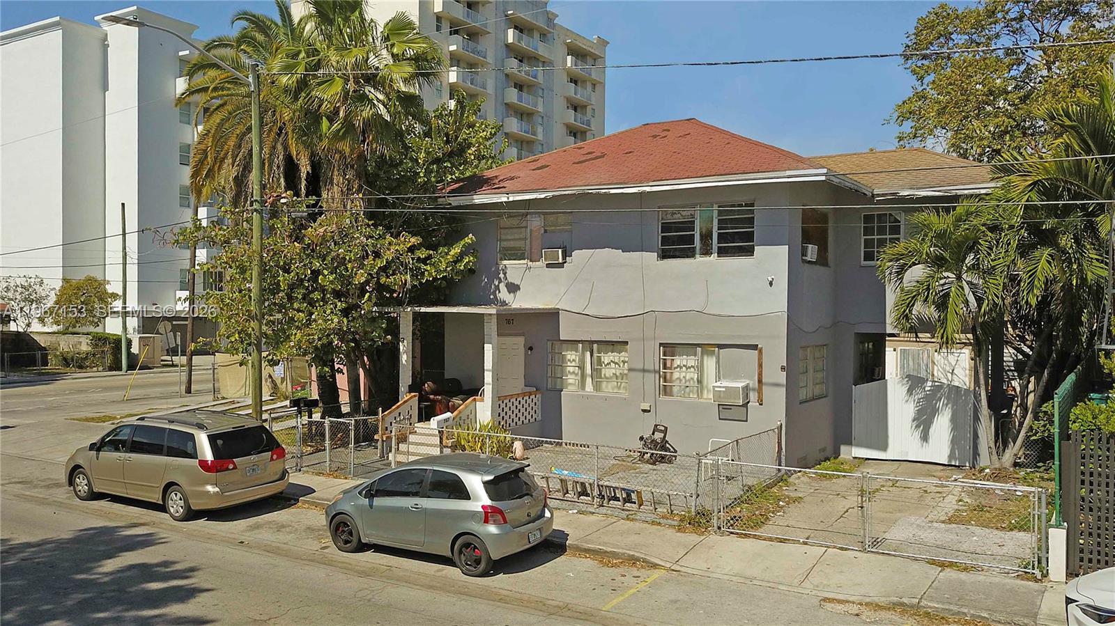 767 Southwest 2nd Street Miami, FL 33130 - Photo 3 of 22 a car parked in front of a house
