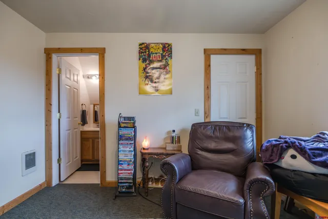 a room with furniture and a couch