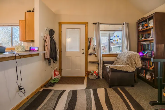 a room with furniture and a window