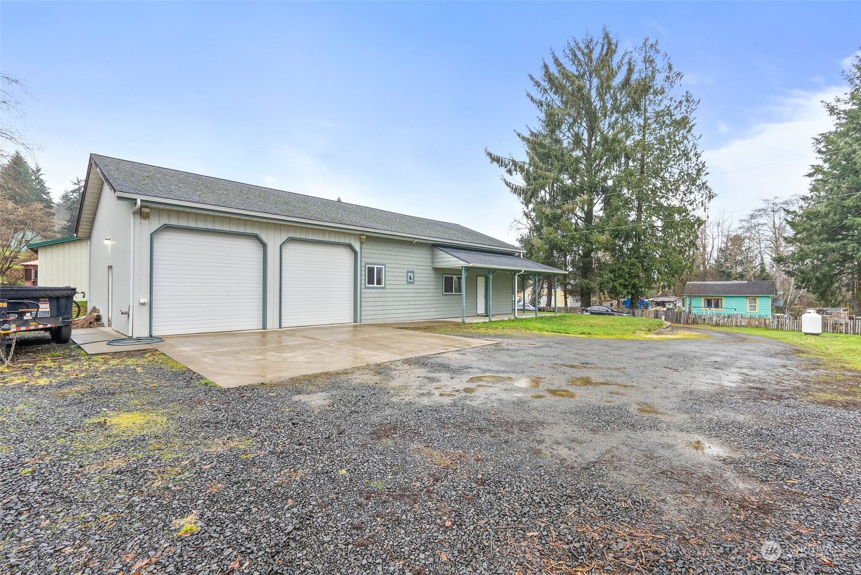 2131 Stuart Street Raymond, WA 98577 - Photo 21 of 25 a view of a house with a yard and sitting area