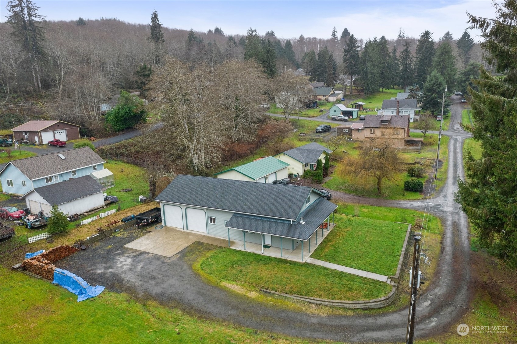 2131 Stuart Street Raymond, WA 98577 - Photo 24 of 25 an aerial view of a house with a yard basket ball court and outdoor seating