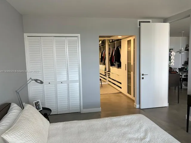 a view of a bedroom with closet area