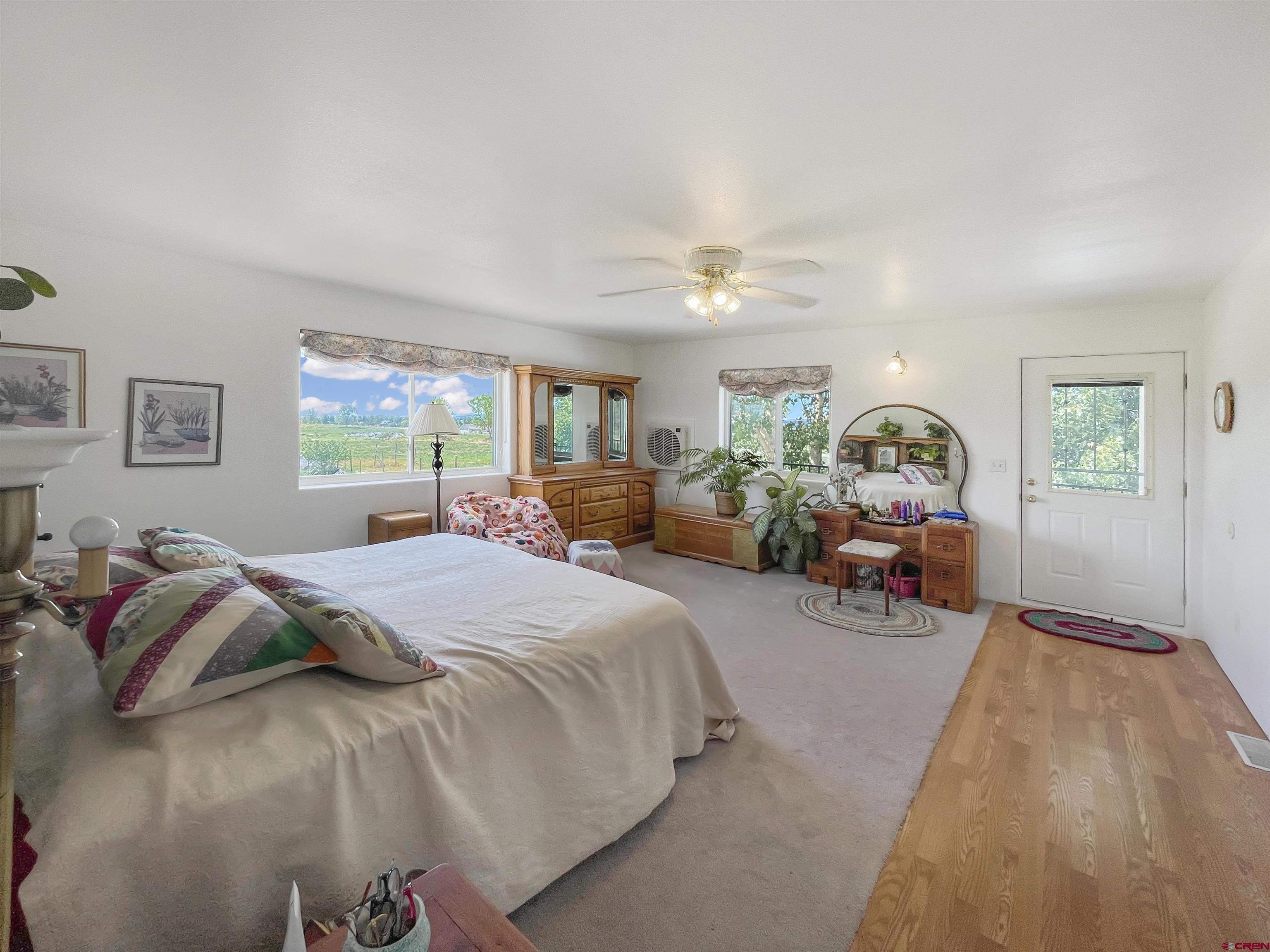 25970 Rd P Cortez, CO 81321 - Photo 12 of 20 a bed room with two beds and a large window