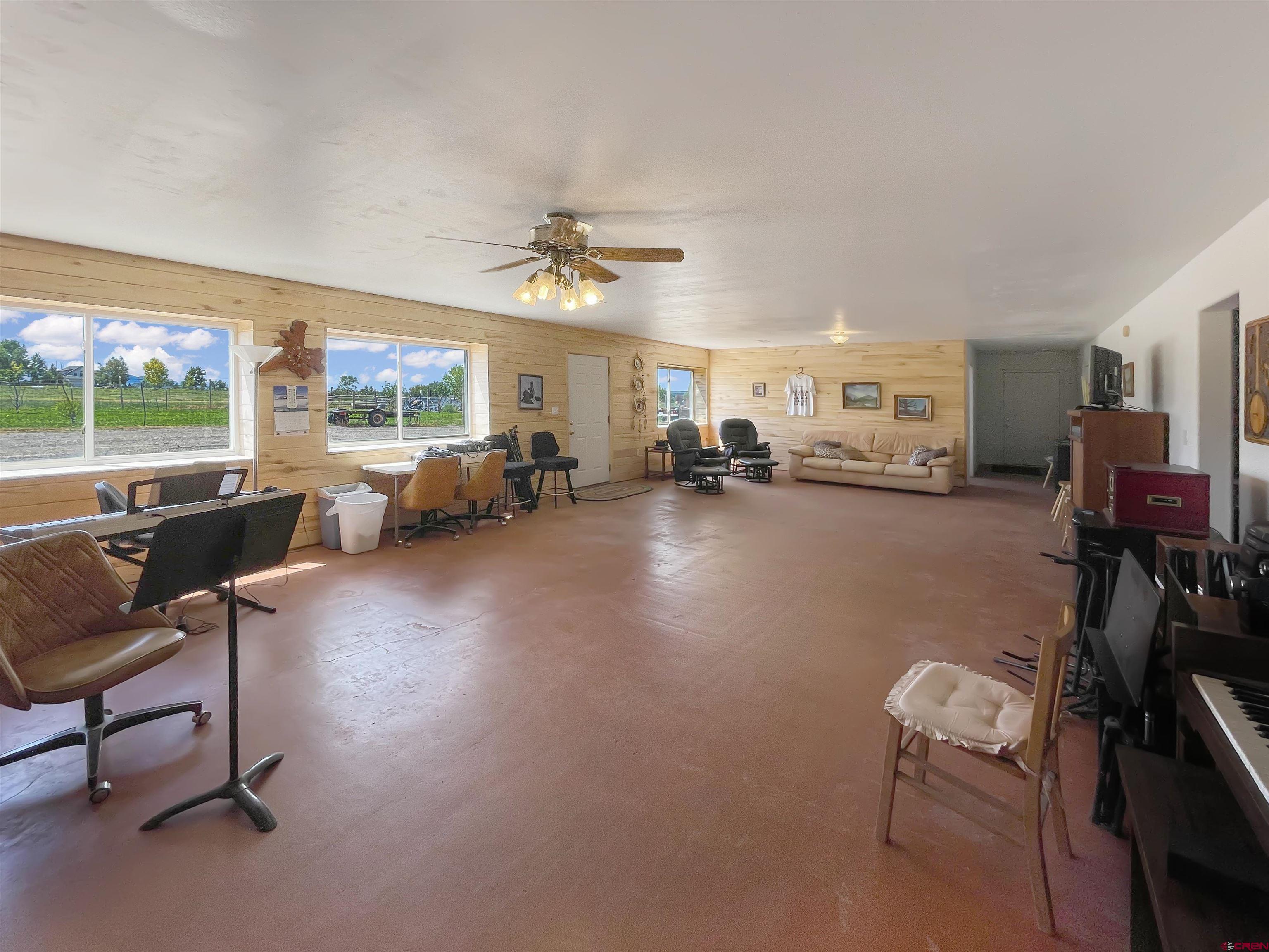 25970 Rd P Cortez, CO 81321 - Photo 14 of 20 a living room with furniture and a flat screen tv