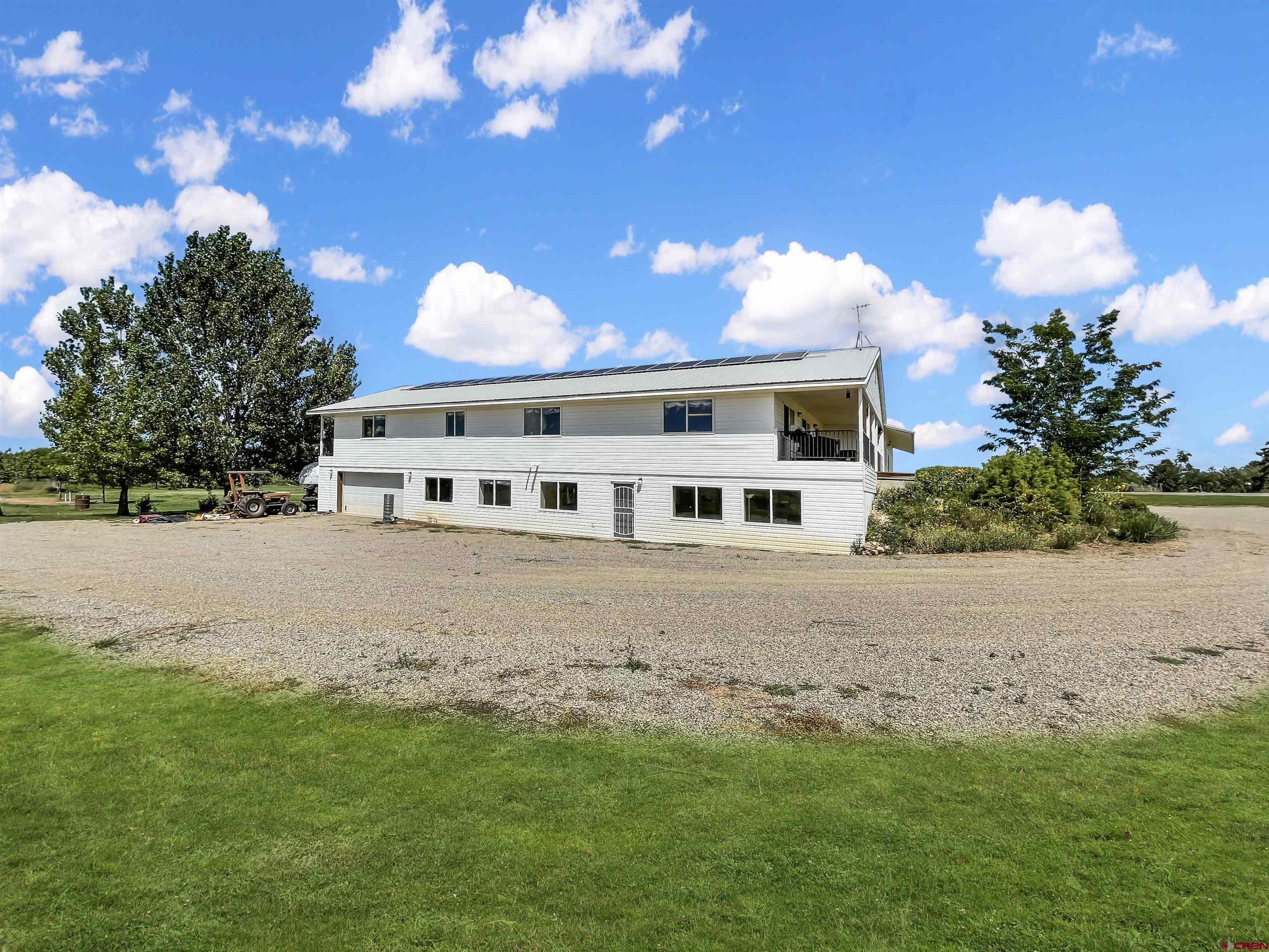 25970 Rd P Cortez, CO 81321 - Photo 4 of 20 a view of a house with a yard