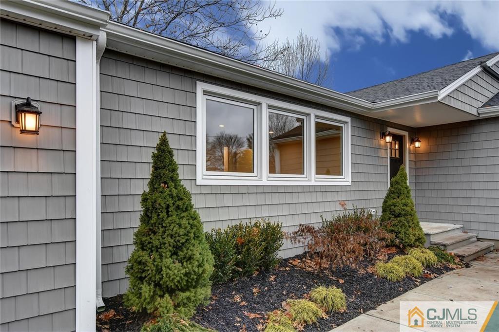 41 Emerson Road Somerset, NJ 08873 - Photo 2 of 25 a front view of a house with a yard