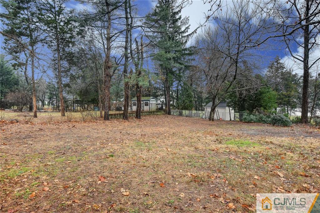 41 Emerson Road Somerset, NJ 08873 - Photo 24 of 25 a view of outdoor space with trees