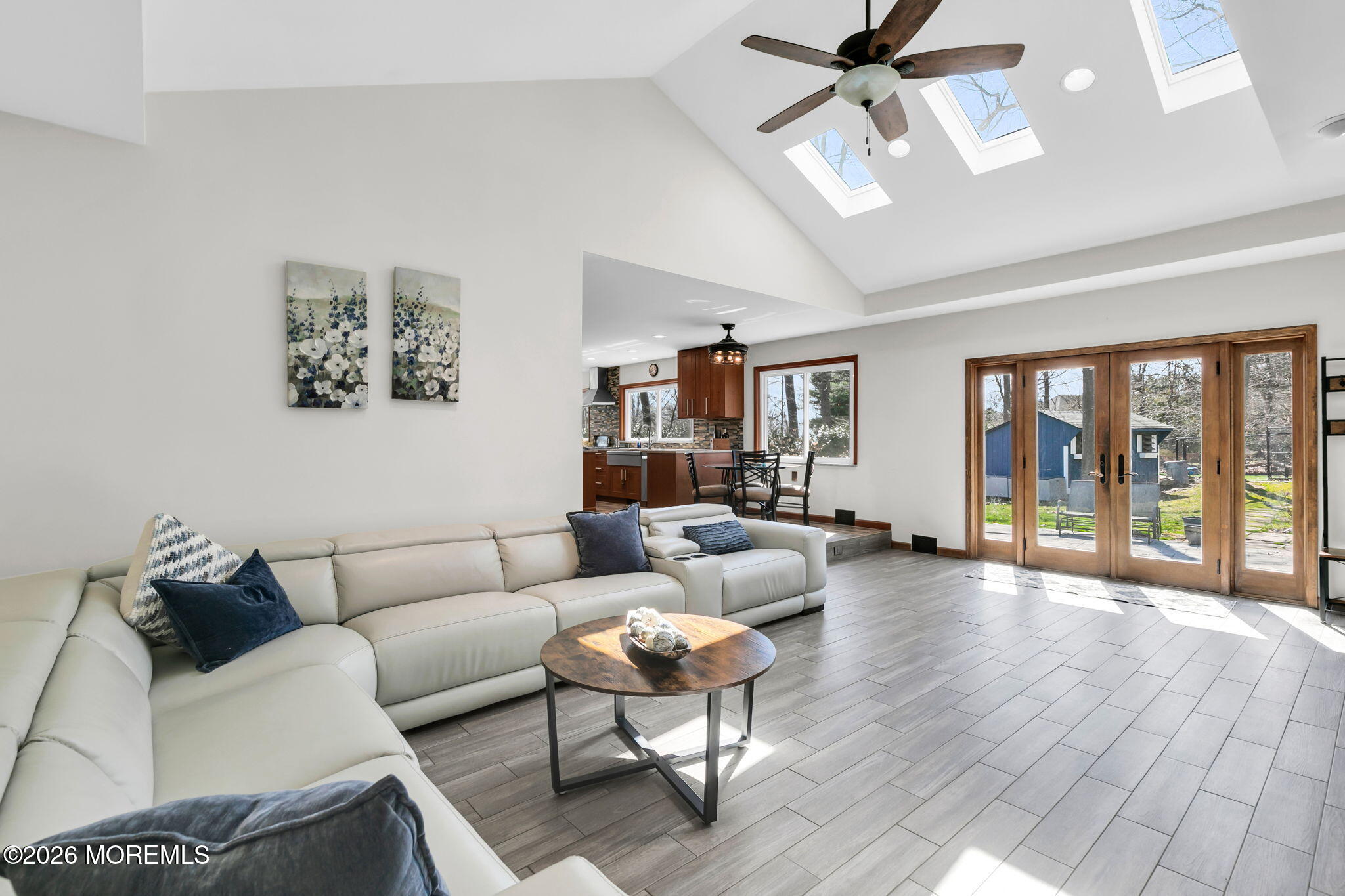 12 Crest Drive Colts Neck, NJ 07722 - Photo 16 of 77 a living room with furniture and wooden floor