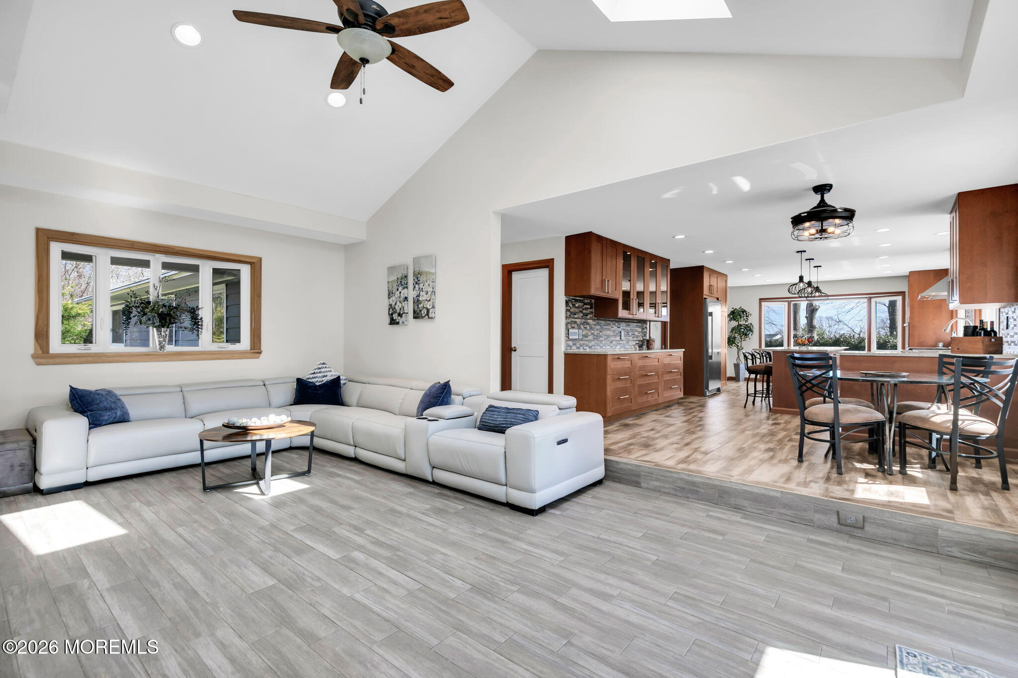 12 Crest Drive Colts Neck, NJ 07722 - Photo 17 of 77 a living room with furniture and wooden floor