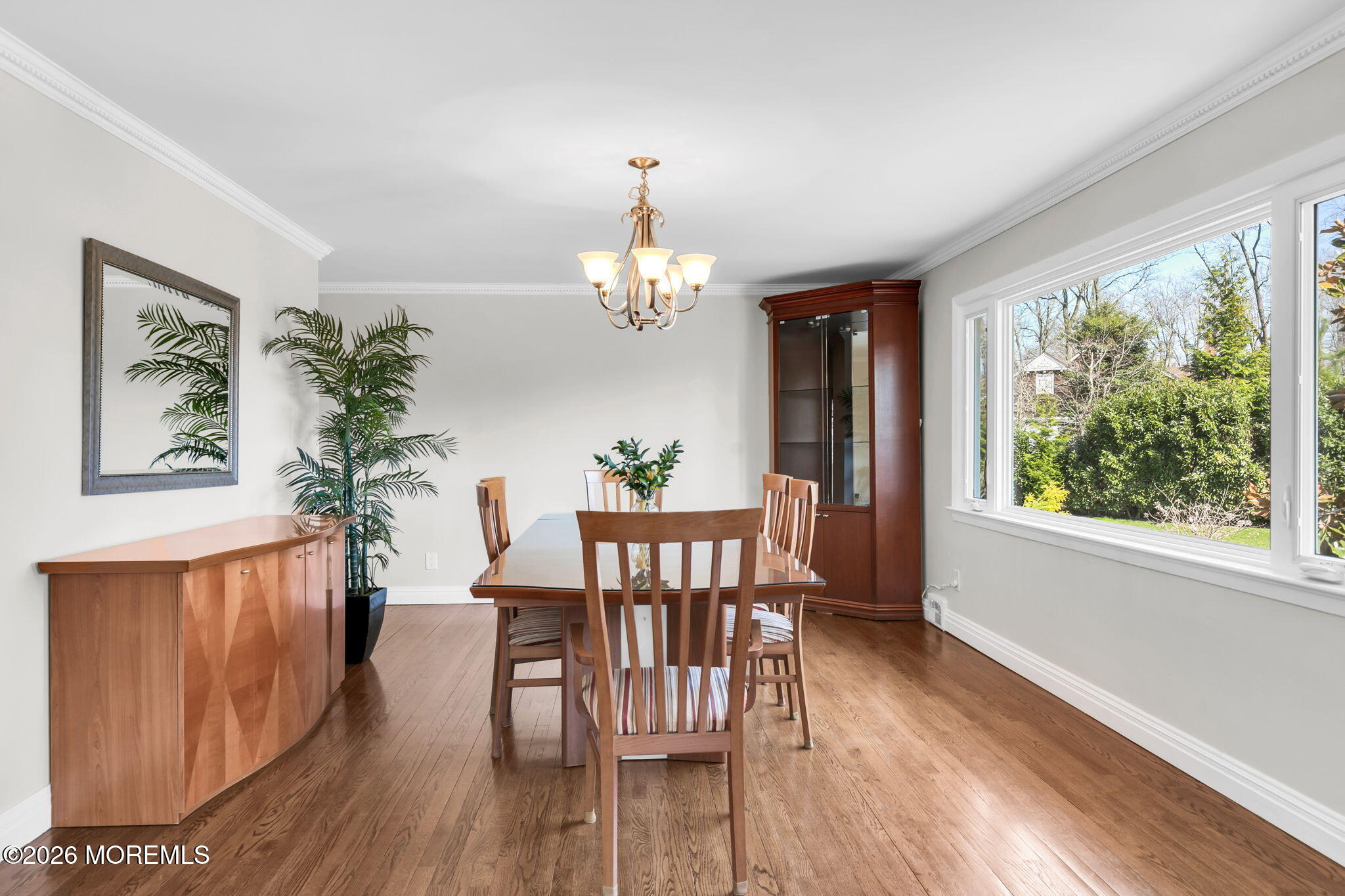 12 Crest Drive Colts Neck, NJ 07722 - Photo 24 of 77 a view of a dining room with furniture window and wooden floor