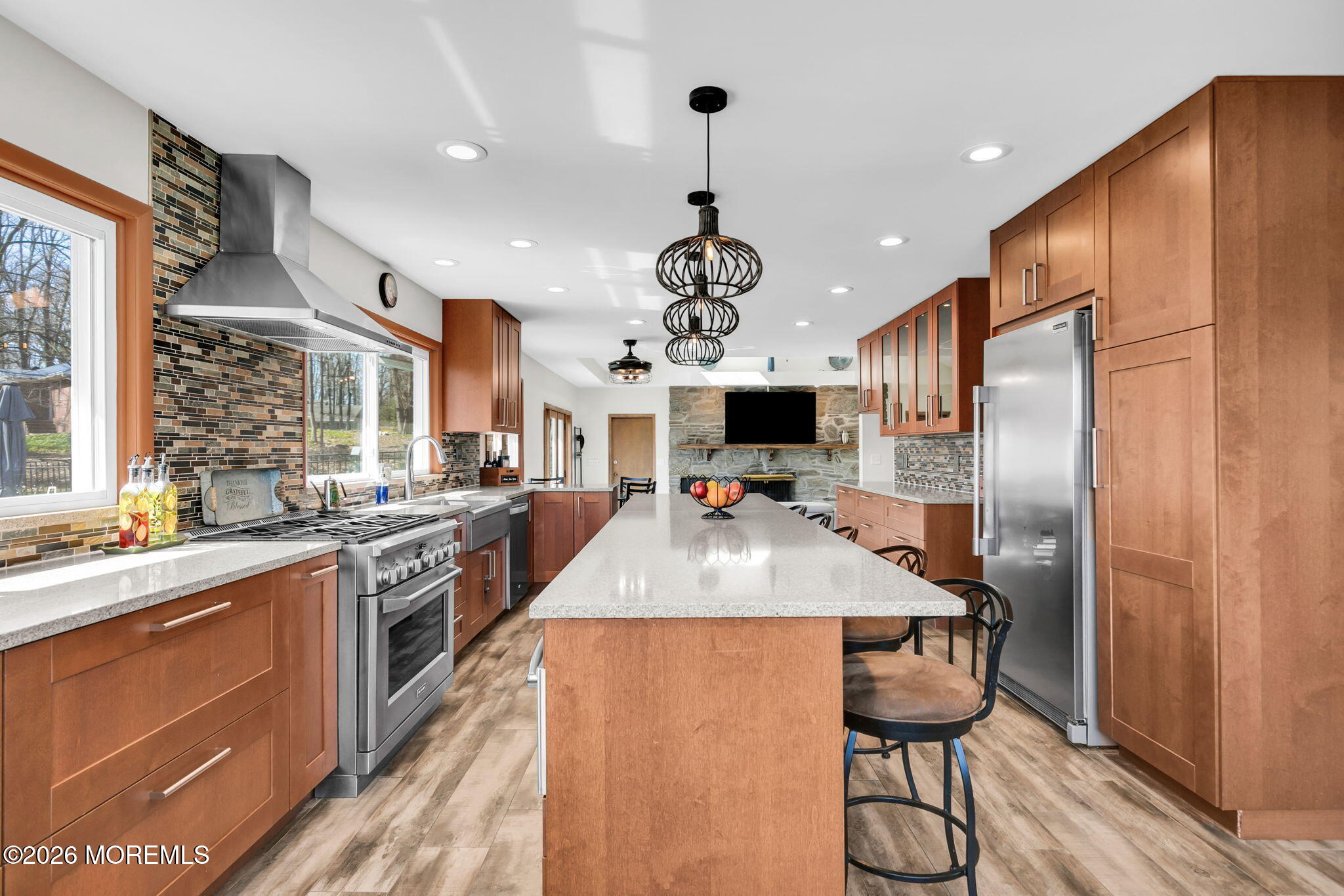 12 Crest Drive Colts Neck, NJ 07722 - Photo 25 of 77 a kitchen with stainless steel appliances granite countertop a sink a stove and a refrigerator