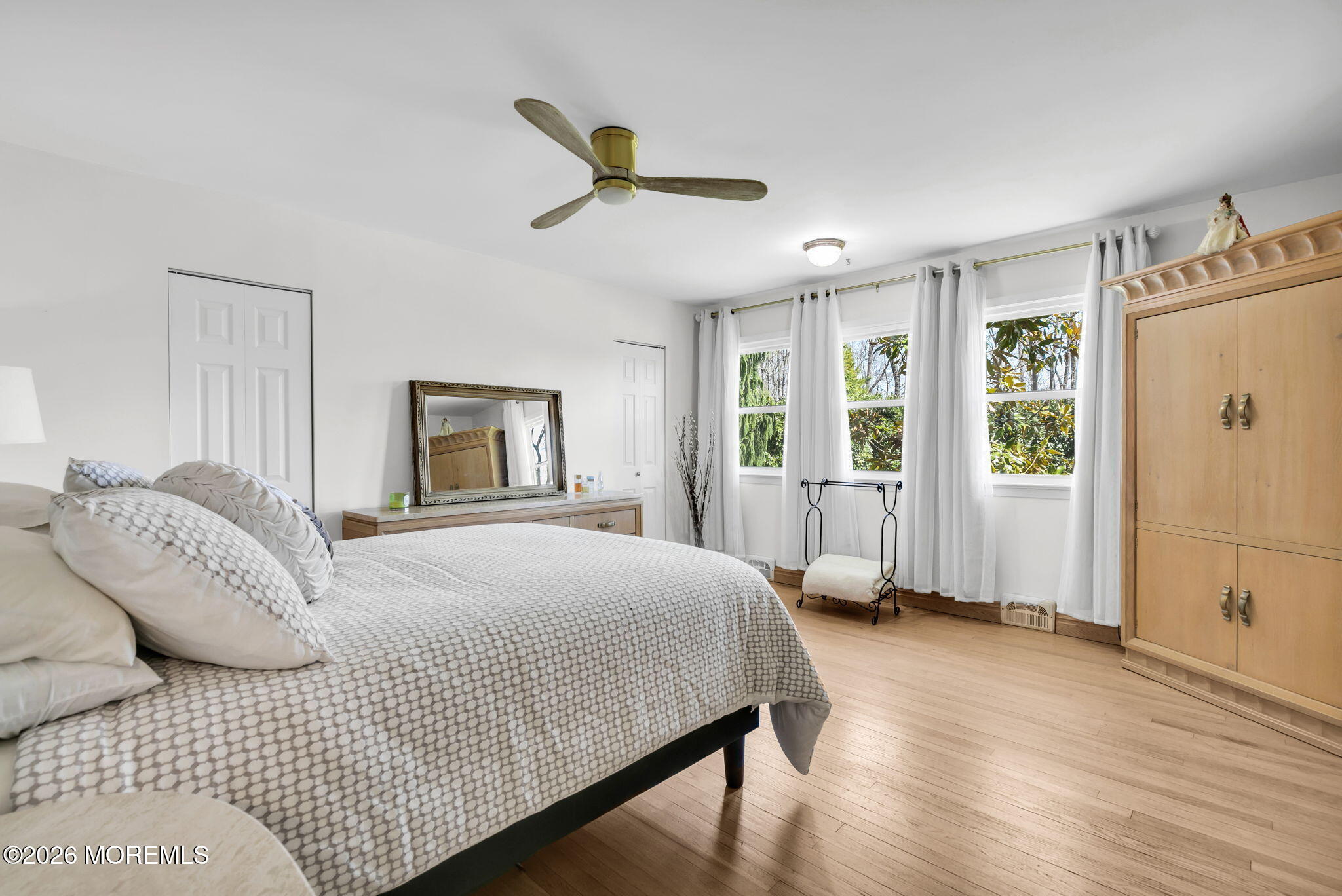 12 Crest Drive Colts Neck, NJ 07722 - Photo 30 of 77 a bedroom with a large bed and a window