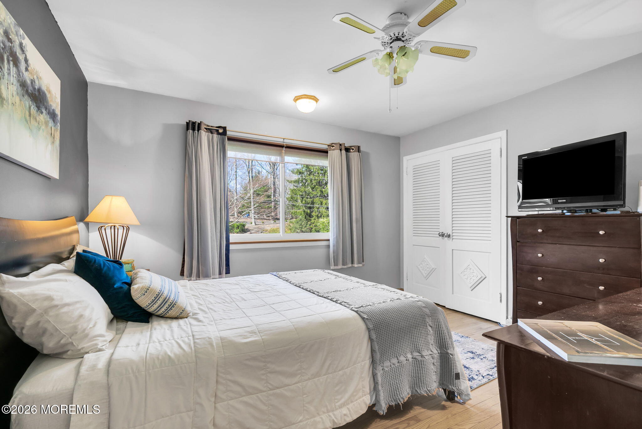 12 Crest Drive Colts Neck, NJ 07722 - Photo 35 of 77 a bedroom with a bed and a flat screen tv