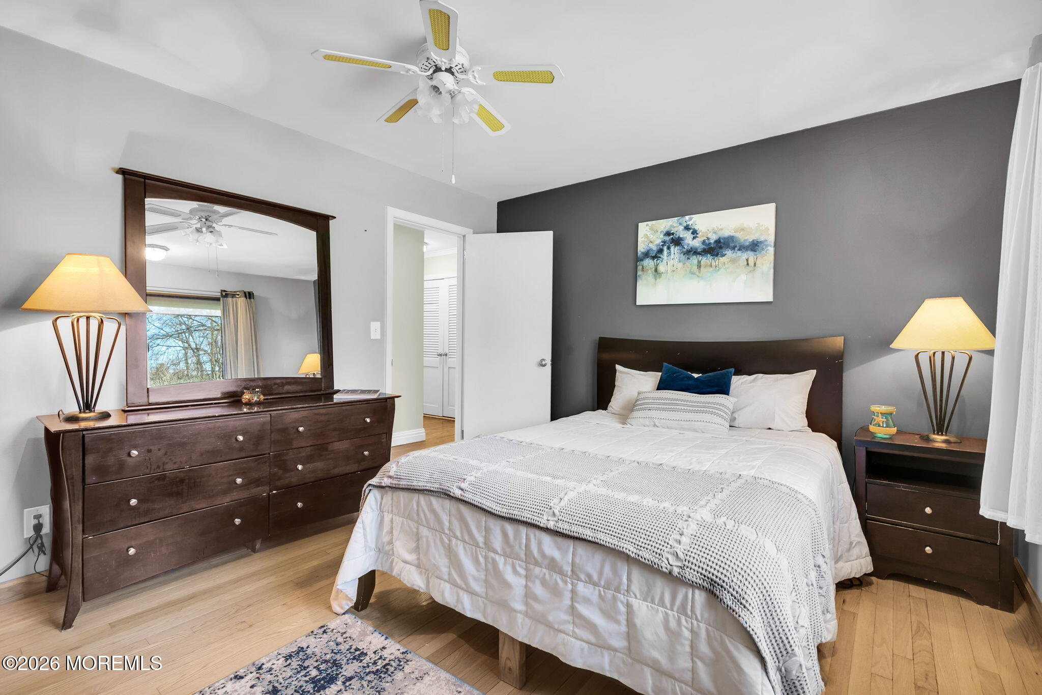 12 Crest Drive Colts Neck, NJ 07722 - Photo 36 of 77 a bedroom with a bed and a dresser