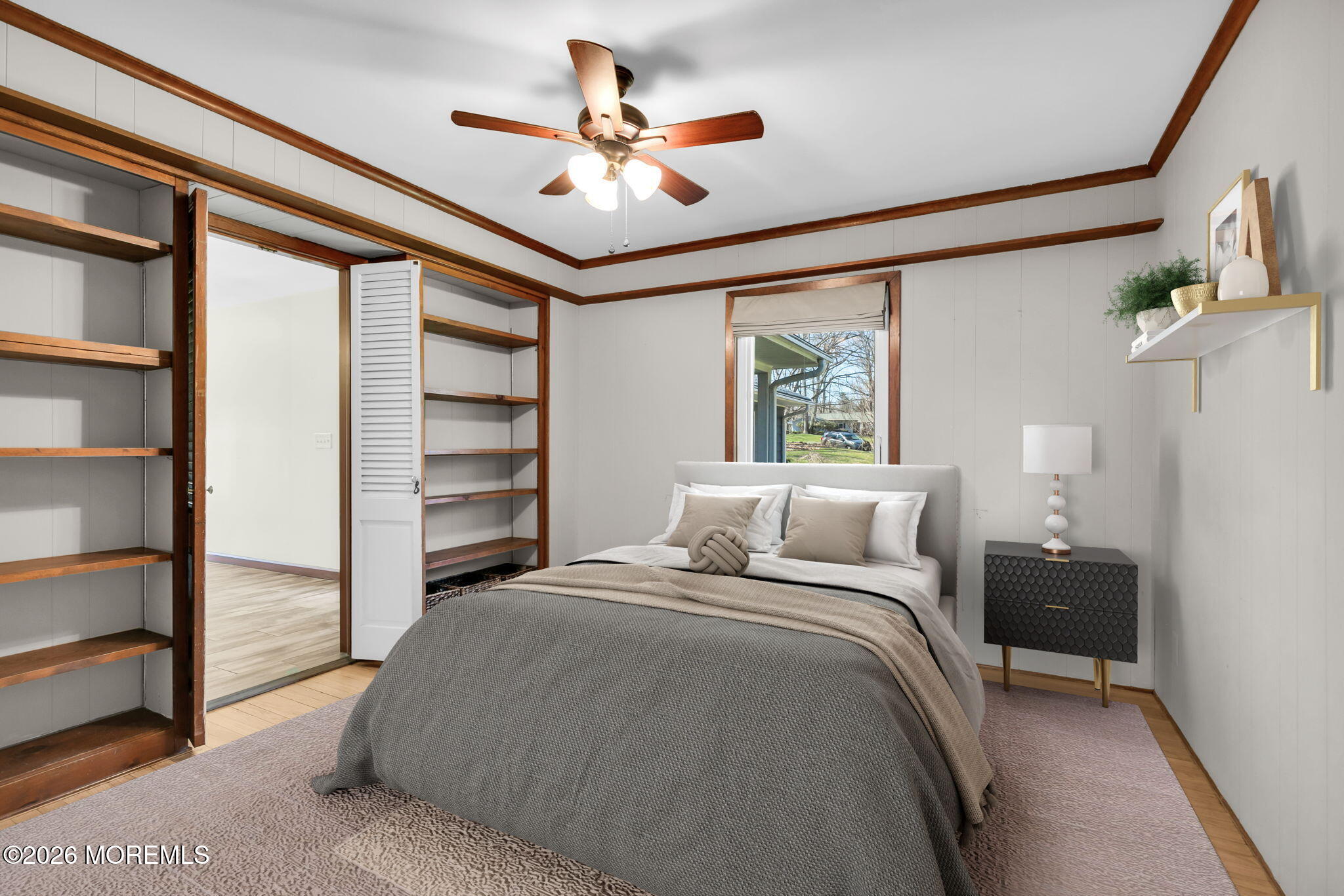 12 Crest Drive Colts Neck, NJ 07722 - Photo 41 of 77 a bed room with a bed and a ceiling fan