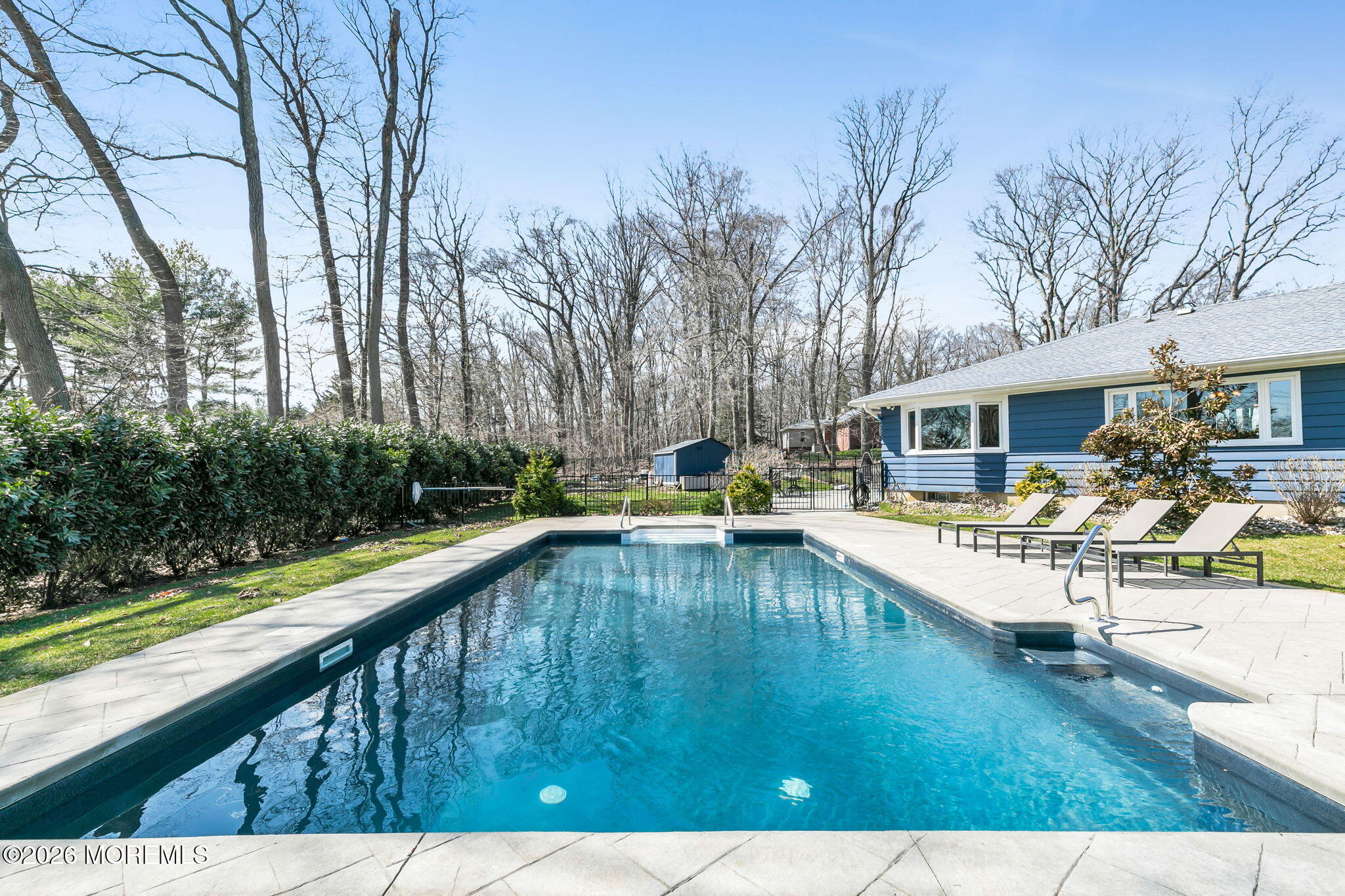 12 Crest Drive Colts Neck, NJ 07722 - Photo 49 of 77 a swimming pool view with a outdoor seating