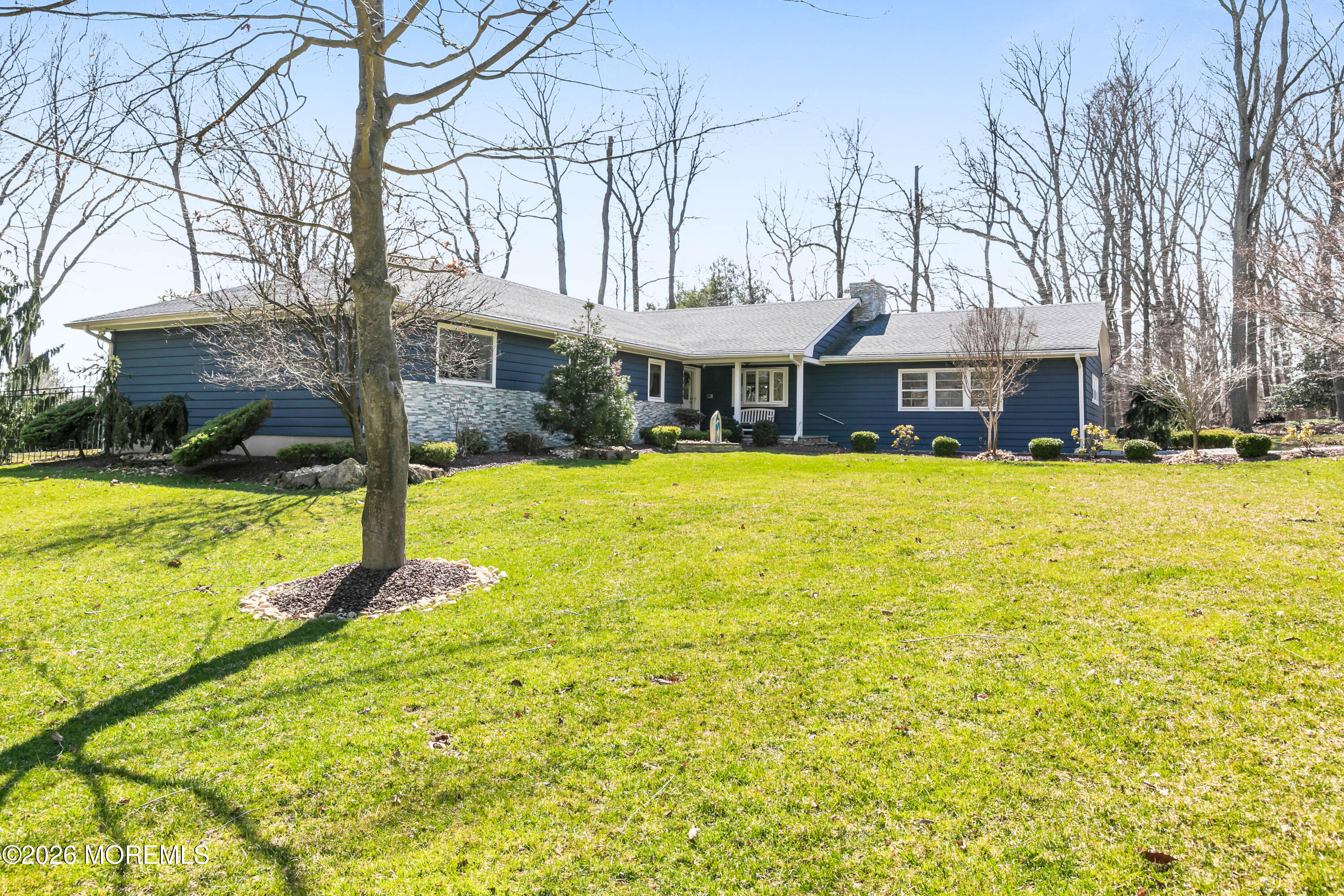 12 Crest Drive Colts Neck, NJ 07722 - Photo 64 of 77 a view of a house with swimming pool and yard