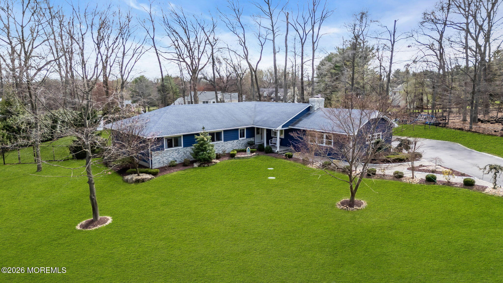 12 Crest Drive Colts Neck, NJ 07722 - Photo 76 of 77 a view of a house with a backyard