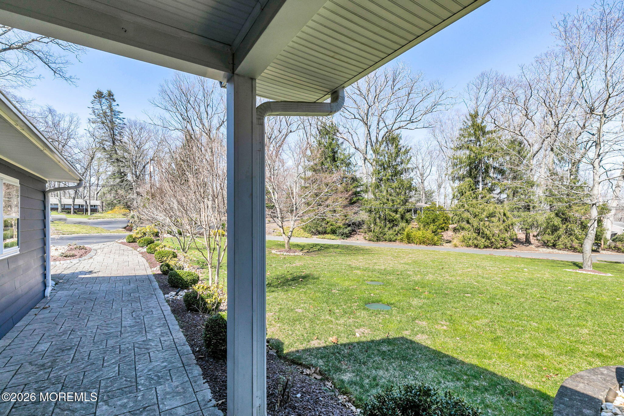 12 Crest Drive Colts Neck, NJ 07722 - Photo 10 of 77 a view of a porch with a yard