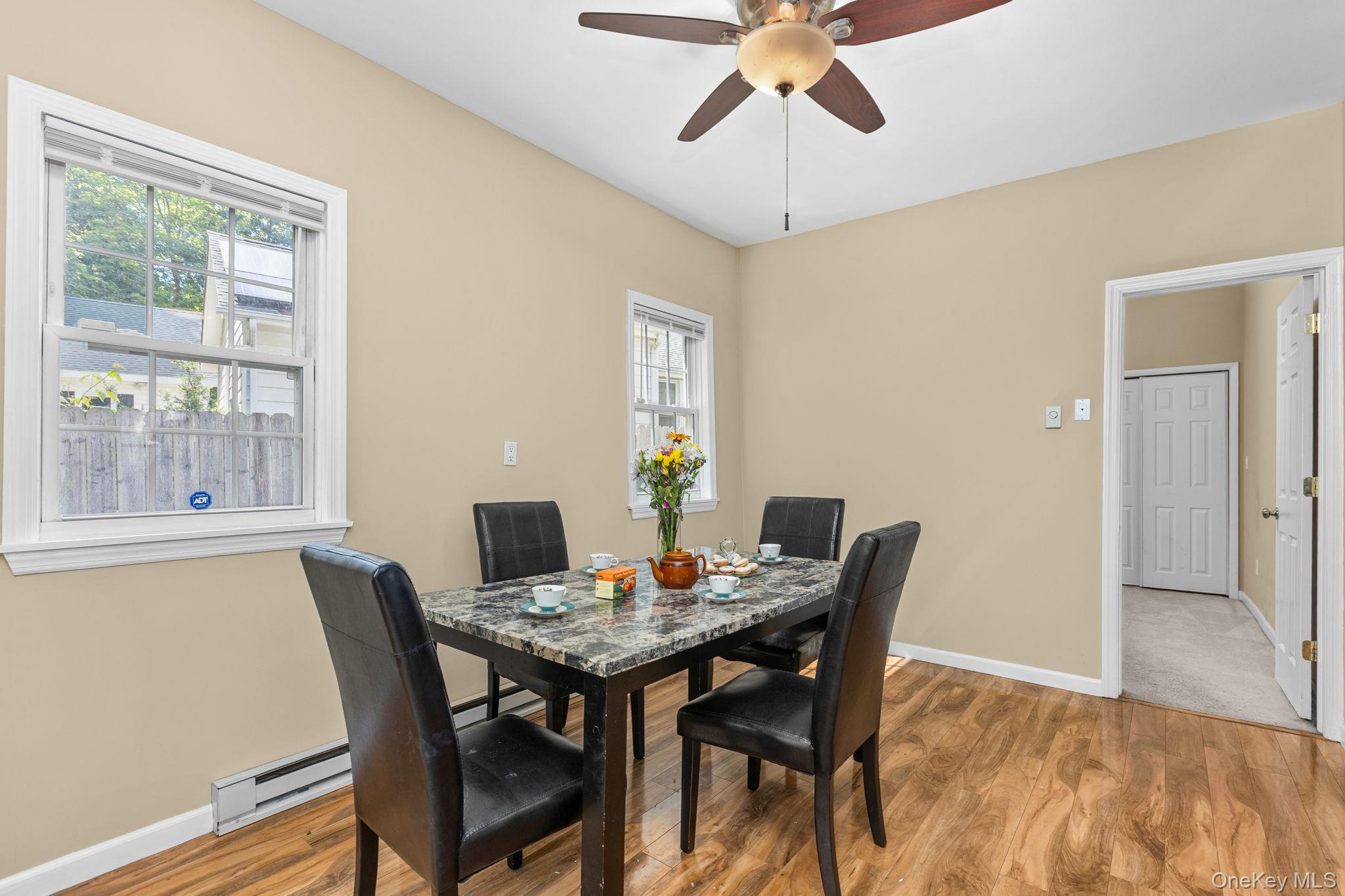 10 Batavia Road Patterson, NY 12563 - Photo 20 of 42 Dining area featuring wood-finish flooring, neutral wall tones, and a ceiling fan