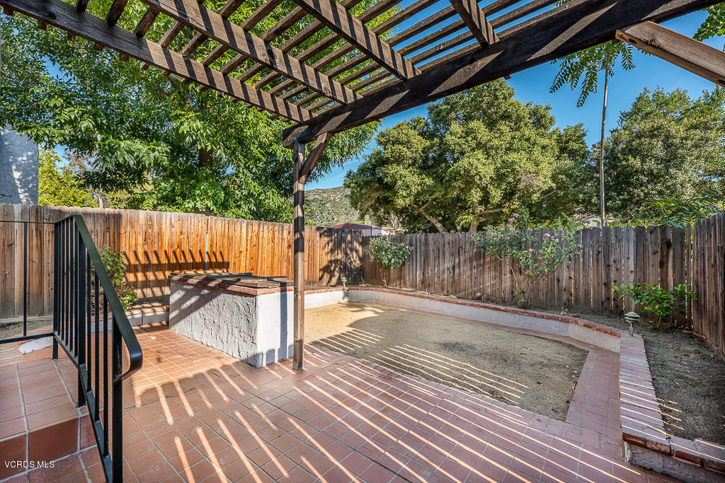 6400 Katherine Road, Unit C Simi Valley, CA 93063 - Photo 18 of 26 a view of a backyard with a deck and wooden floor