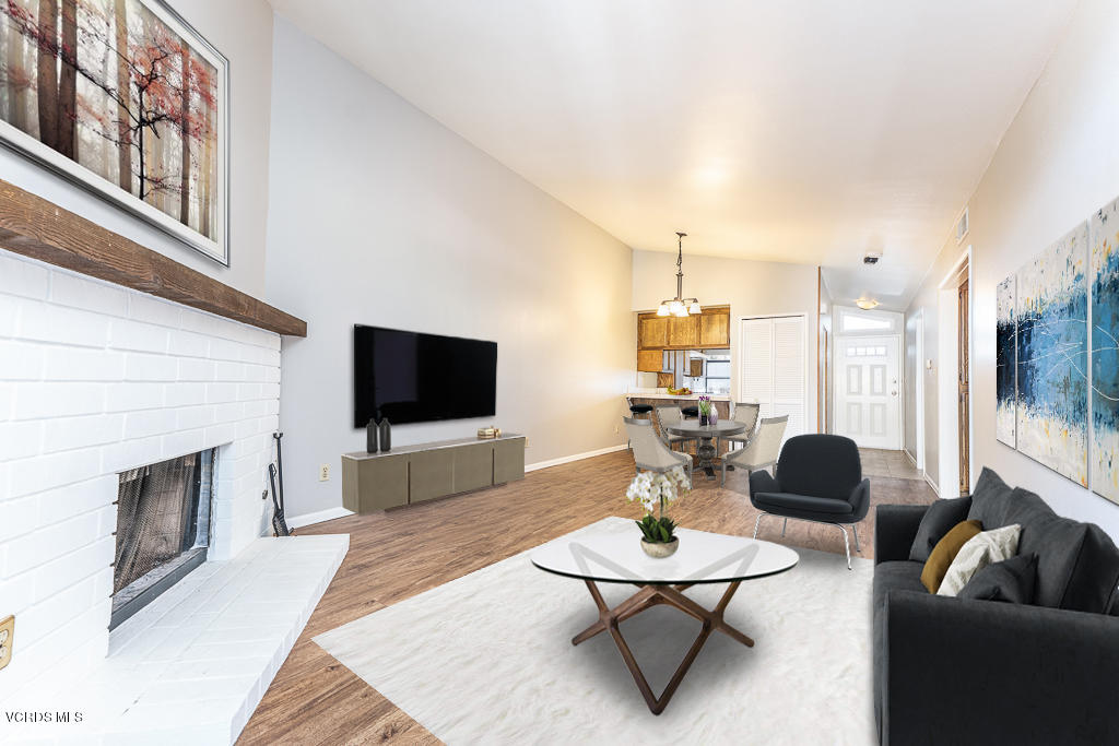 6400 Katherine Road, Unit C Simi Valley, CA 93063 - Photo 4 of 26 a living room with furniture and a flat screen tv