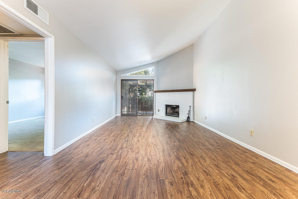 6400 Katherine Road, Unit C Simi Valley, CA 93063 - Photo 6 of 26 wooden floor fireplace and natural light in room