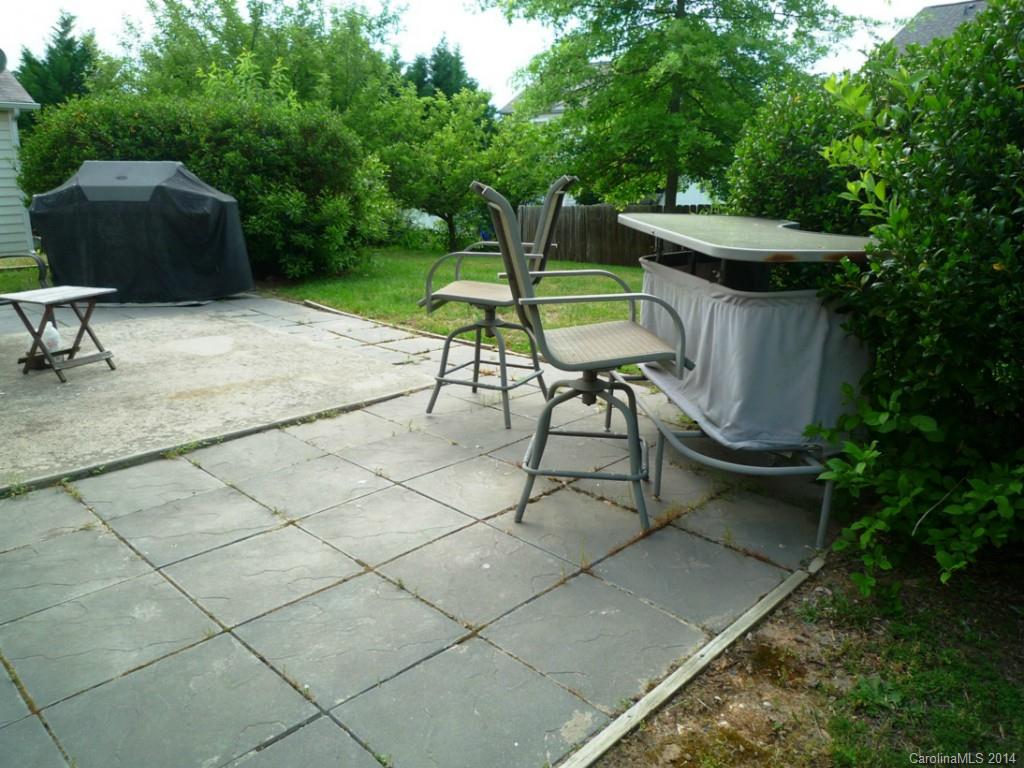 3102 Tanzanite Circle Fort Mill, SC 29708 - Photo 18 of 18 a view of backyard with seating space and trees