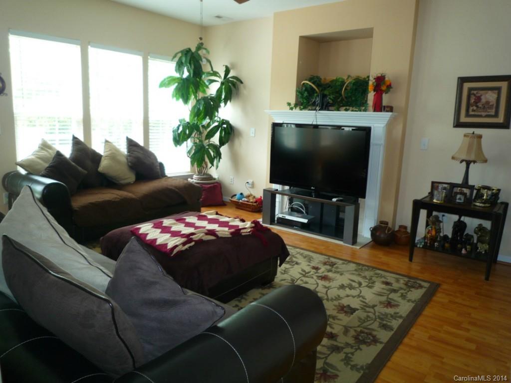 3102 Tanzanite Circle Fort Mill, SC 29708 - Photo 3 of 18 a living room with furniture and a flat screen tv