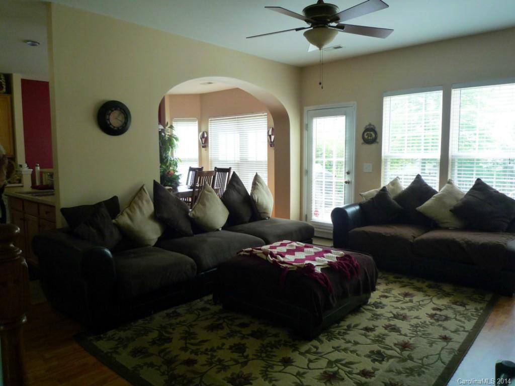 3102 Tanzanite Circle Fort Mill, SC 29708 - Photo 4 of 18 a living room with furniture and a large window