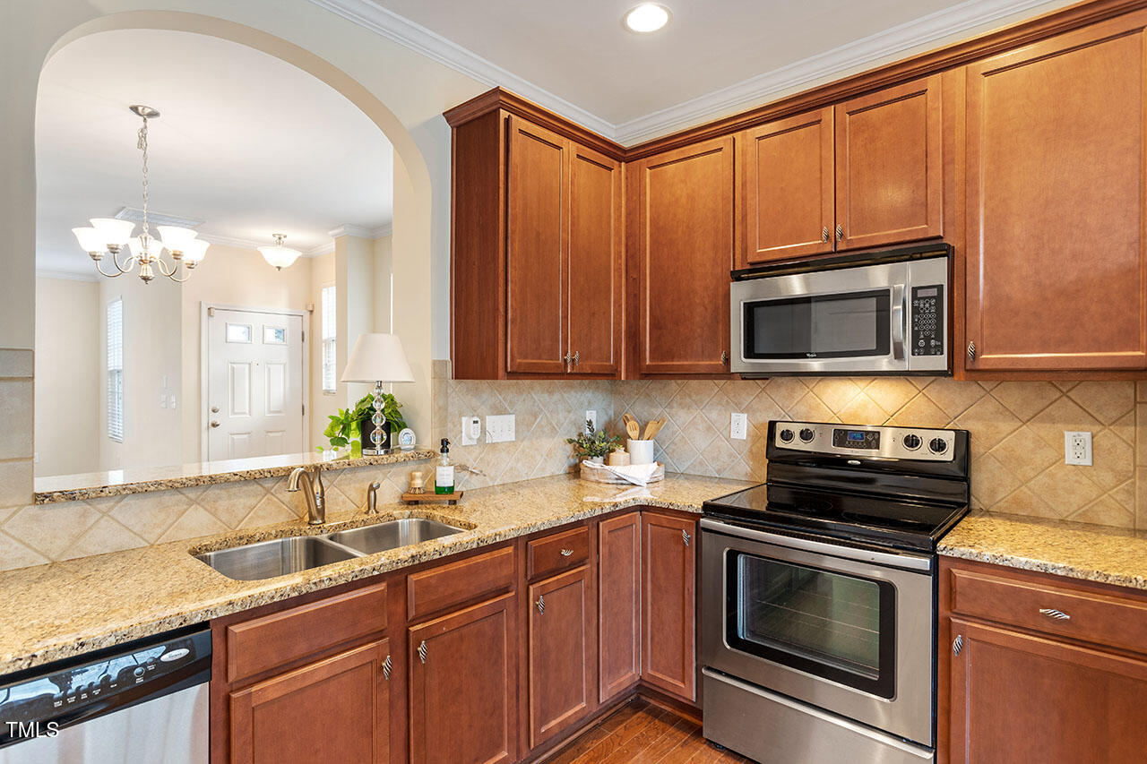 864 Cupola Drive Raleigh, NC 27603 - Photo 12 of 26 Pass through to kitchen