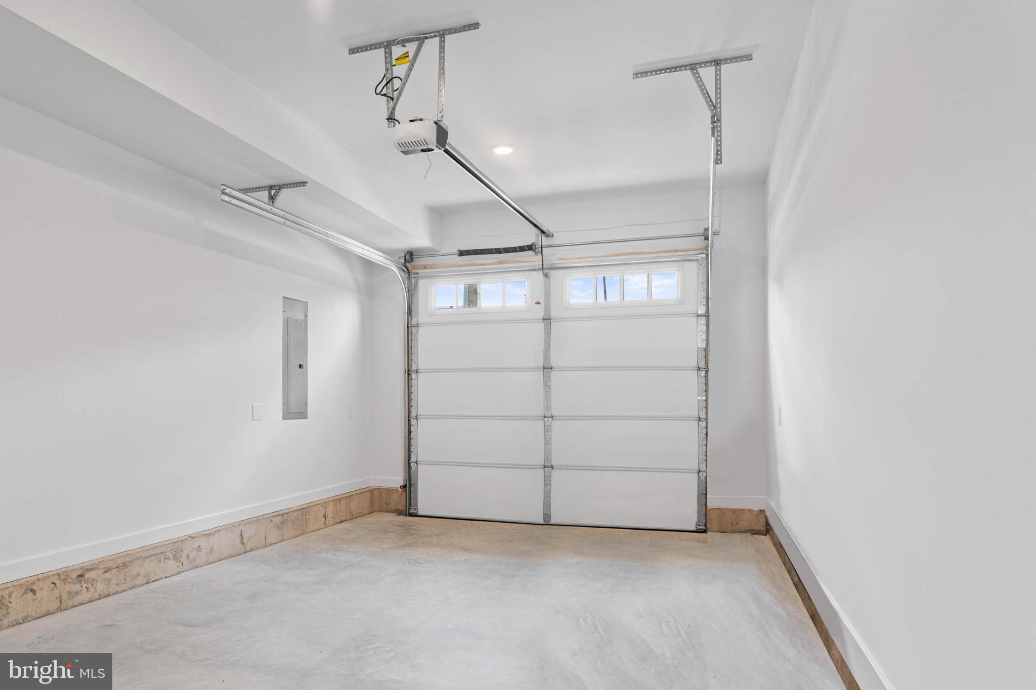205 8th Street Bridgeport, PA 19405 - Photo 14 of 15 Spacious, modern garage with sleek design.