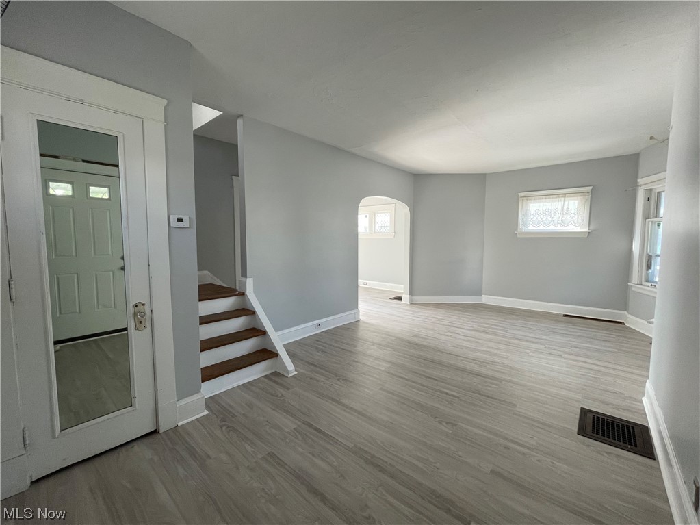 Living room featuring light grey LVT flooring