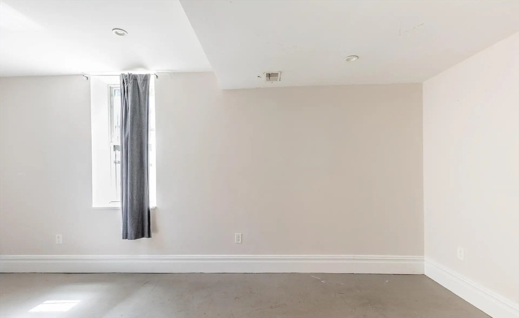 89 Cedar Street, Unit 2 Boston, MA 02119 - Photo 18 of 27 a view of empty room