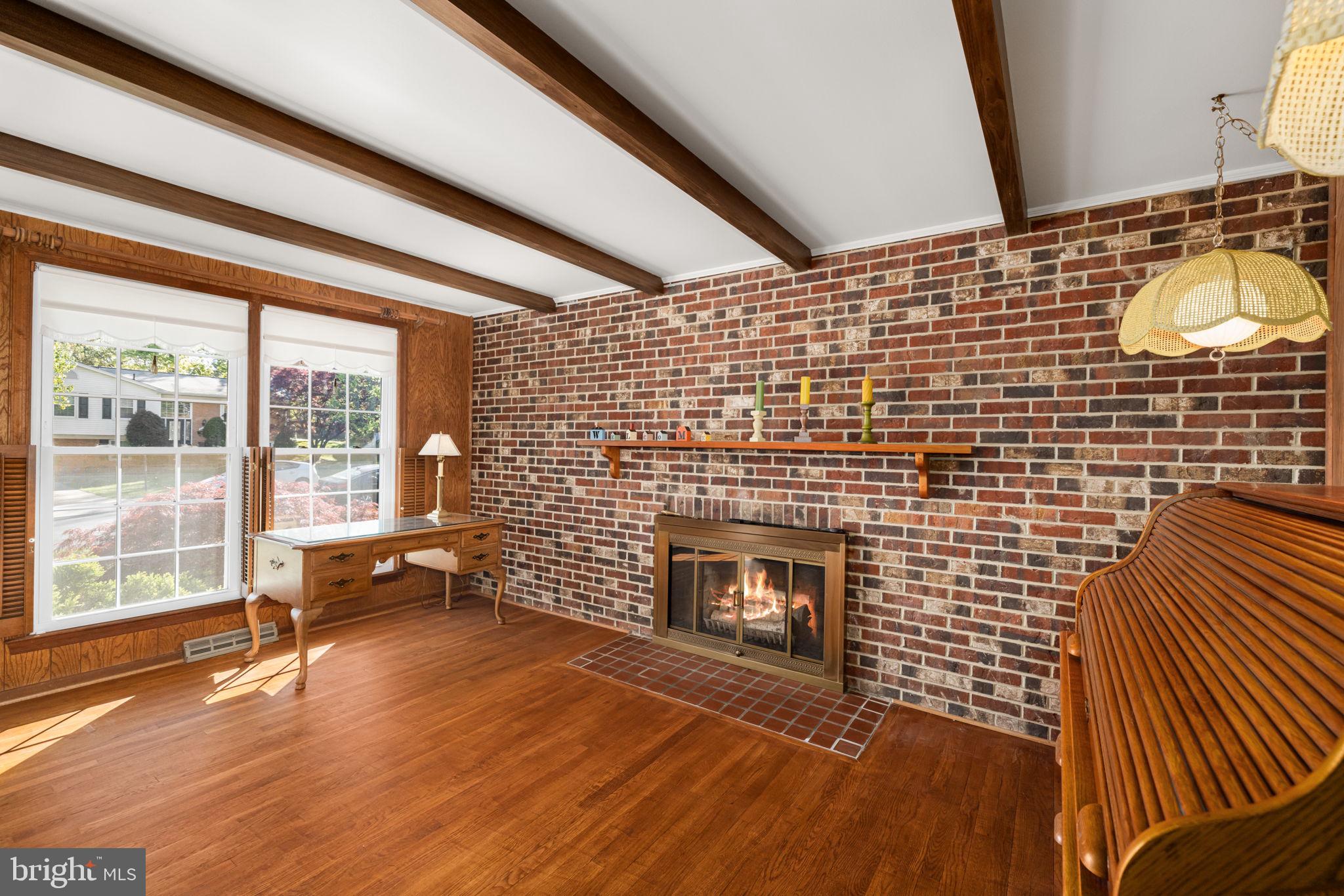 8220 Smithfield Avenue Springfield, VA 22152 - Photo 25 of 63 Cozy Library with fireplace