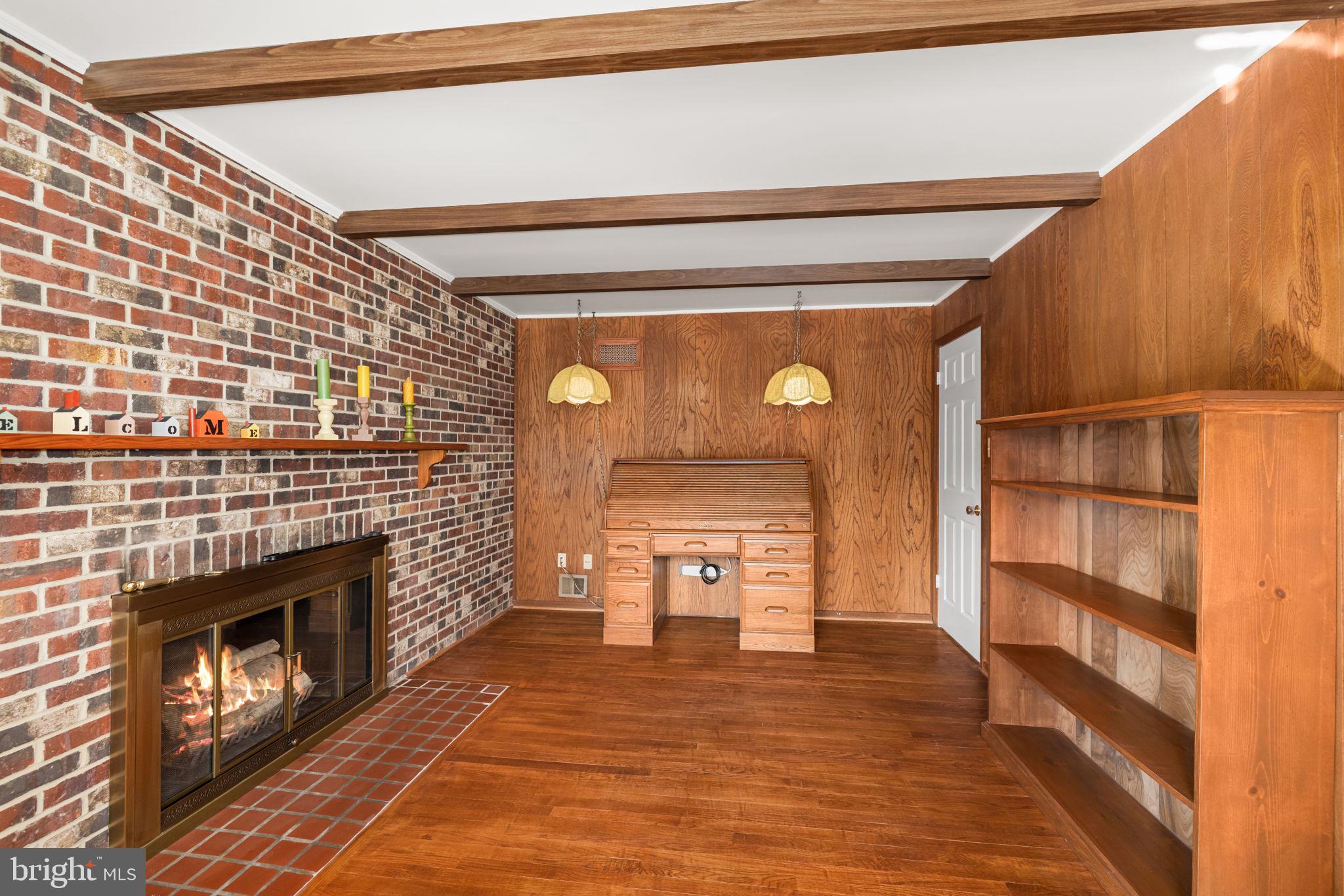 8220 Smithfield Avenue Springfield, VA 22152 - Photo 26 of 63 Cozy Library with fireplace