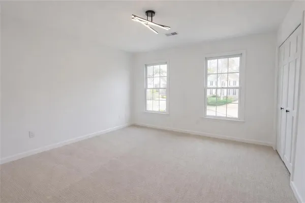 an empty room with windows
