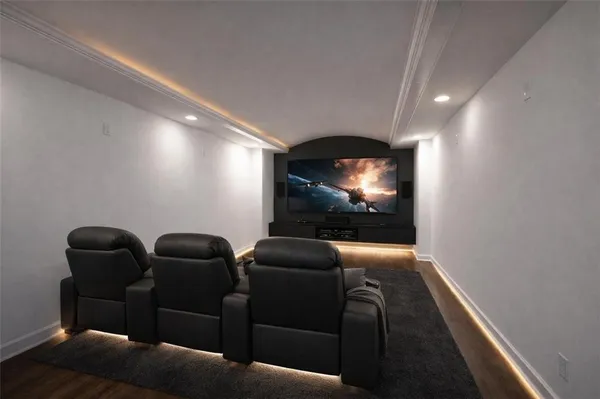 a projector room with furniture and screen