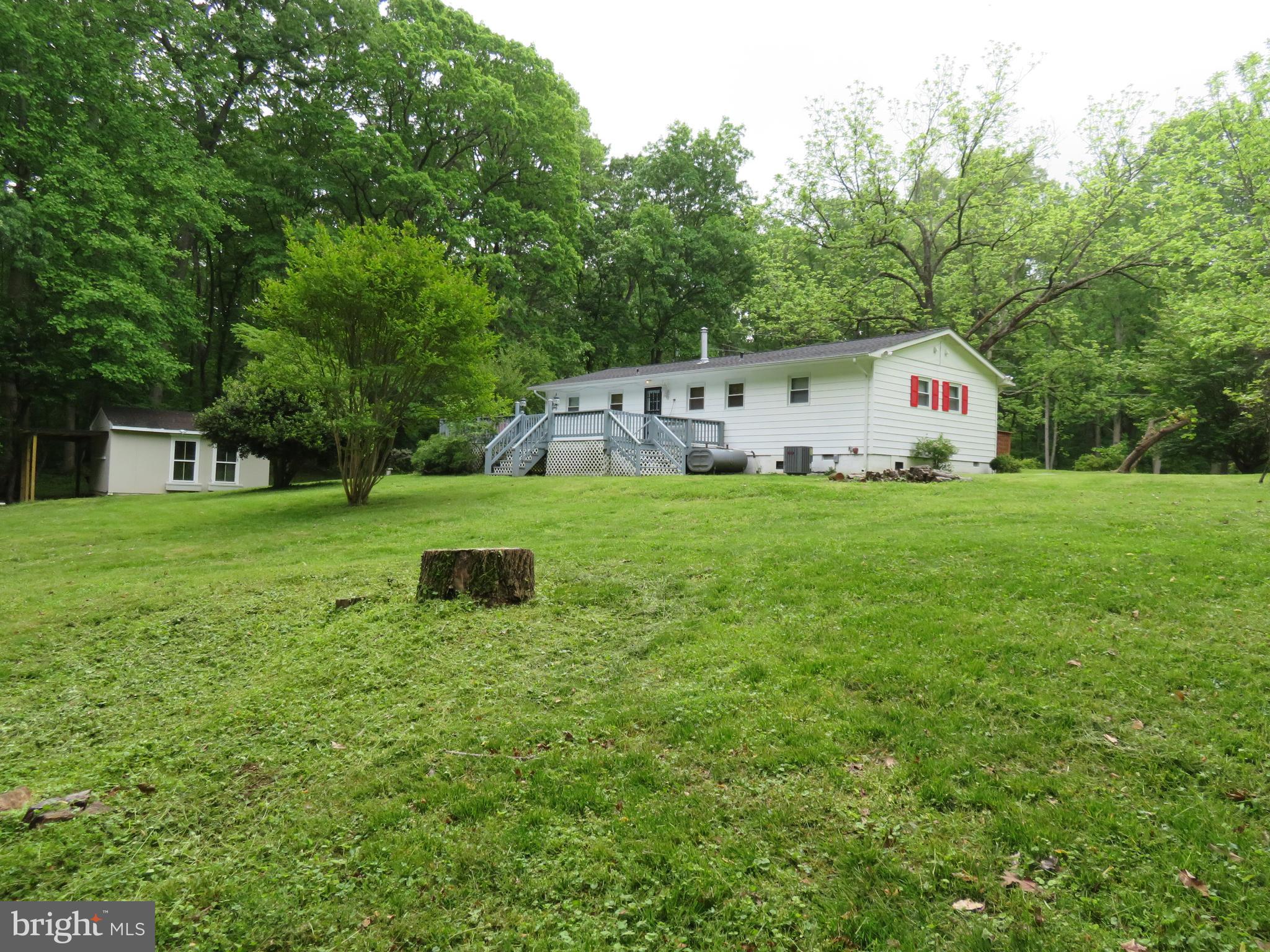 8700 McGrath Road Manassas, VA 20112 - Photo 24 of 30 View of back of the House showing Deck and Shed.