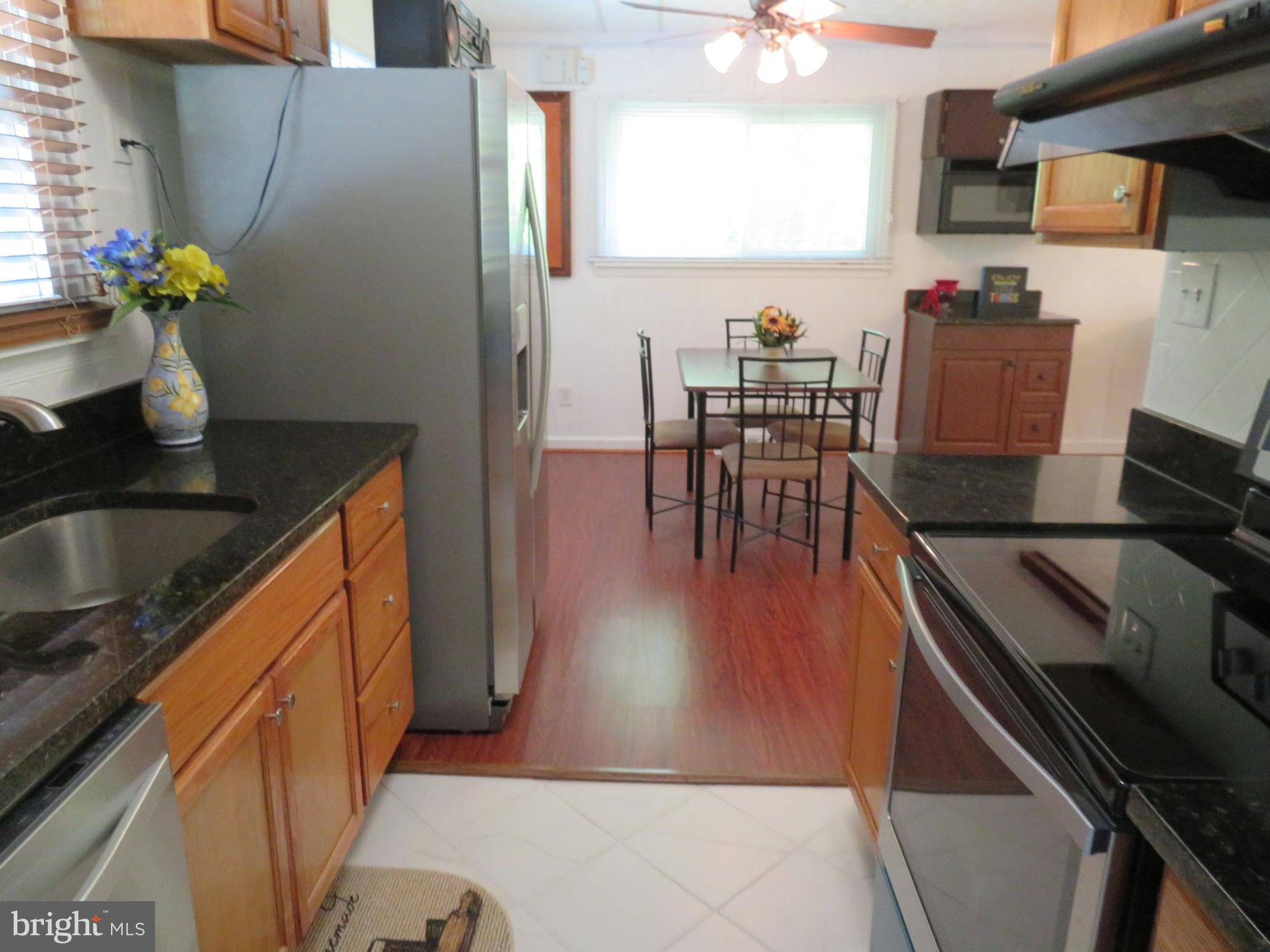 8700 McGrath Road Manassas, VA 20112 - Photo 7 of 30 View of the Kitchen into the Dining Room