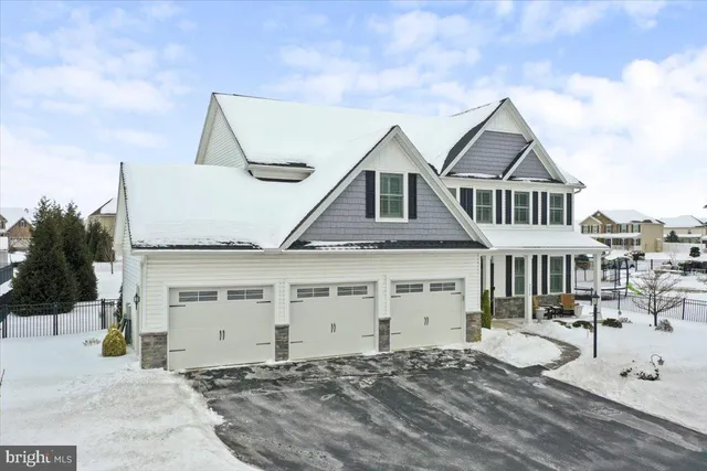 a view of a white house with a outdoor space
