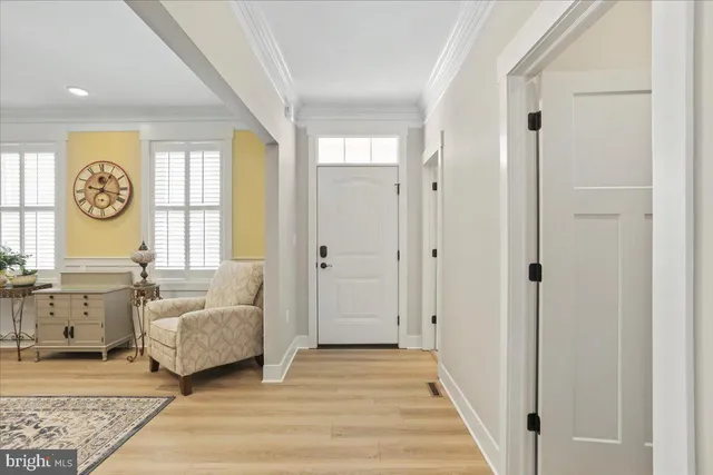 a spacious bedroom with a bed and a window